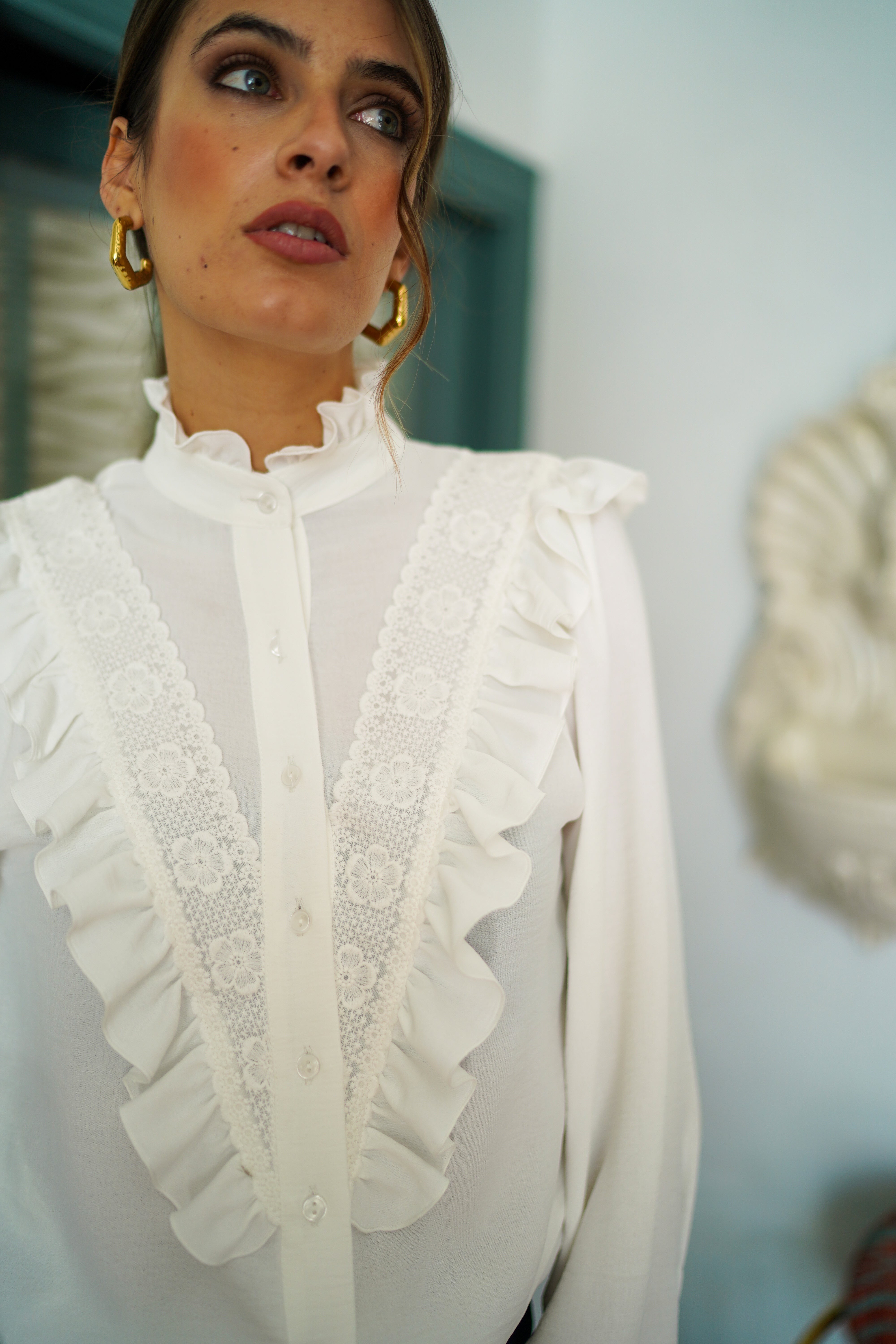 Blusa volante de pico