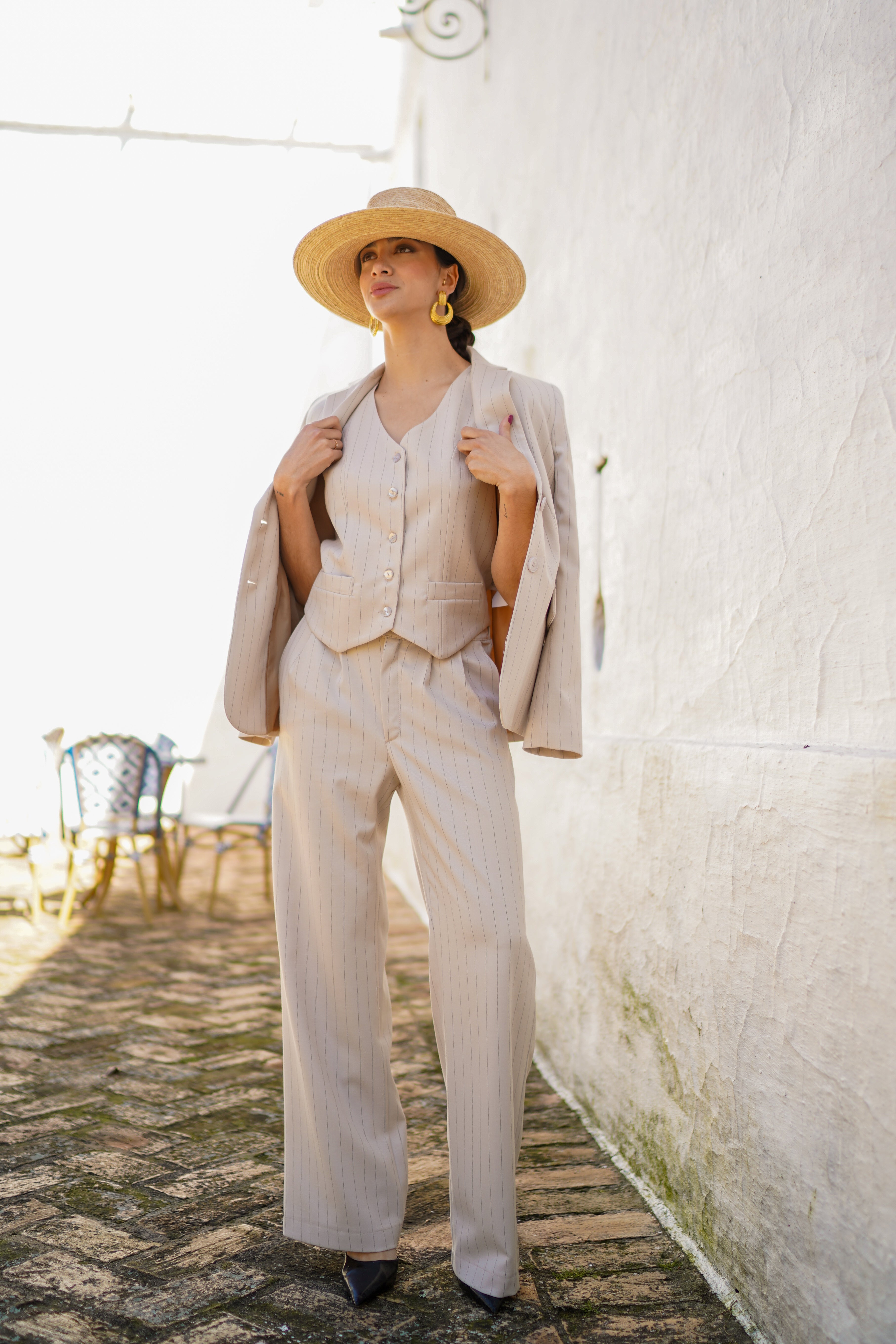 Pantalon cinturilla pico y goma rayas