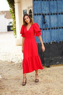 Vestido volante y mangas globo