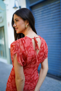 Vestido museta drapeada capa