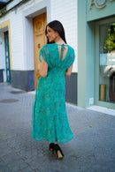 Vestido museta drapeada capa