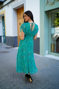 Vestido museta drapeada capa