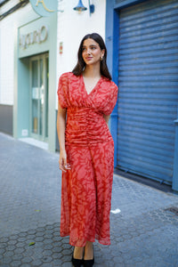 Vestido museta drapeada capa